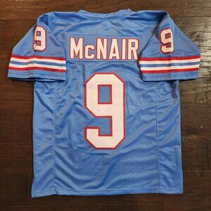 Steve McNair #9 Houston Oilers Columbia blue jersey. Size Large